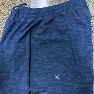 Blue, Like new, mens 6” lululemon shorts. Built in liner.